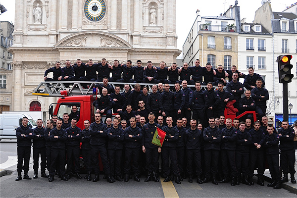 The Svign Fire Station Team, in front of Saint Paul Church