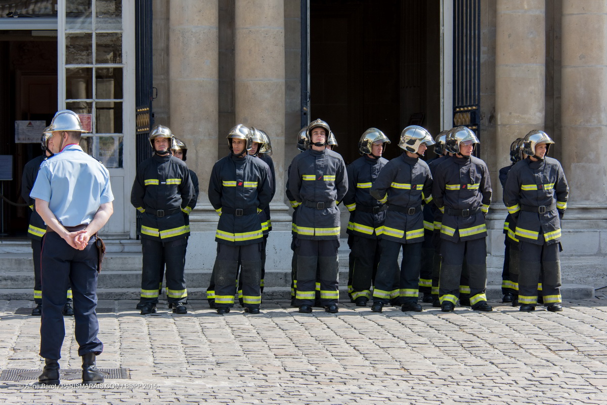 PARISIAN FIREMEN WELCOME YOU TO THE GREATEST OPEN-AIR DANCE FLOOR IN LE MARAIS